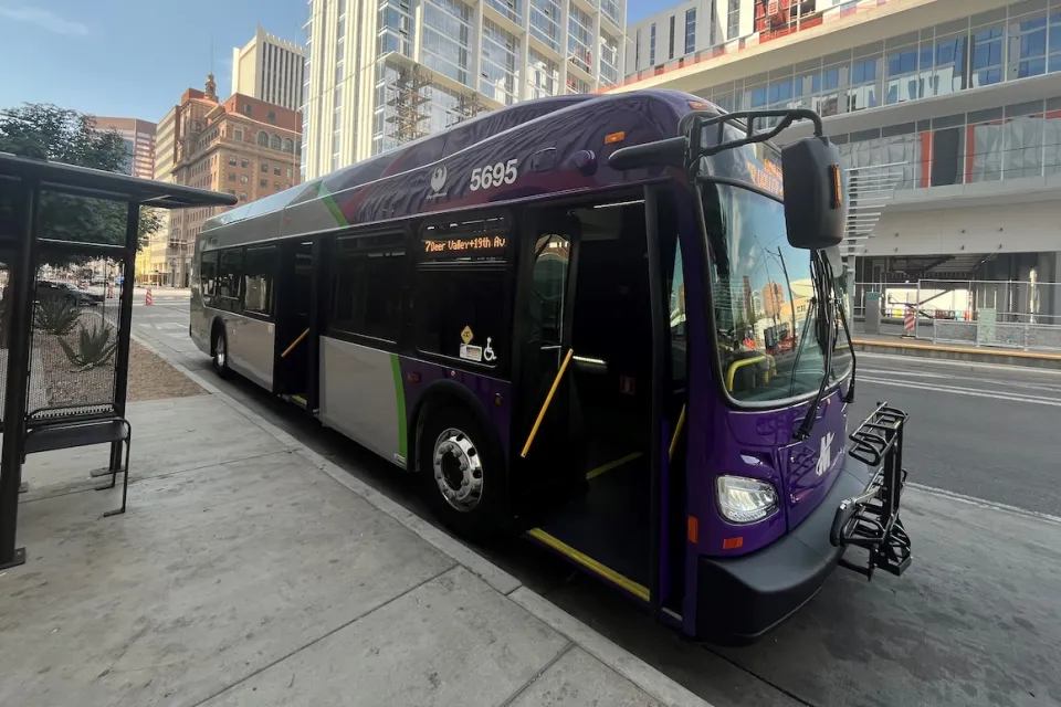 Black and purple hybrid Phoenix Public Transit bus.